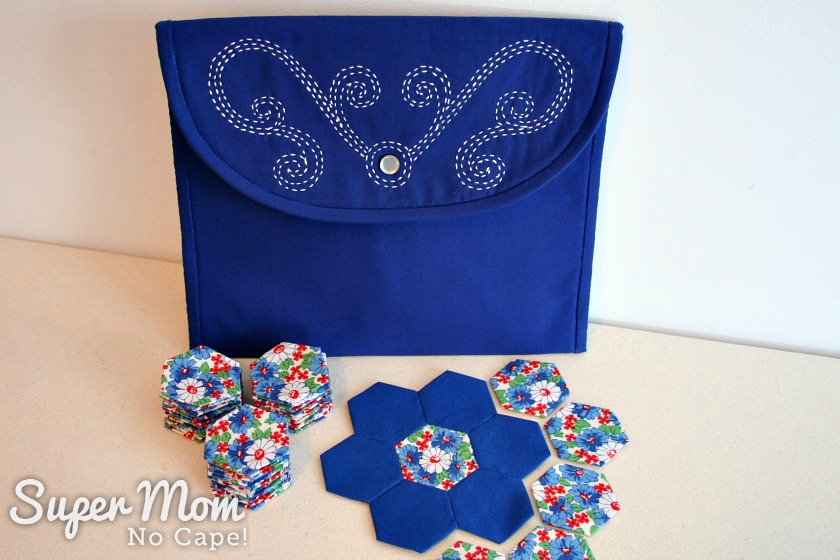 Making Waves Sashiko Embroidered Pouch pictured with floral and blue hexies and hexie flower